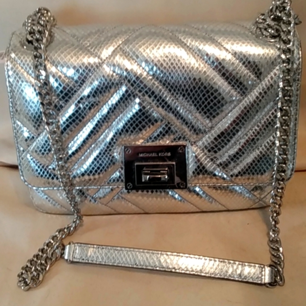 Michael Kors Vivianne silver embossed leather purse, new never used.